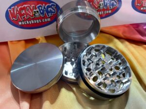 Image of a 4-piece stainless steel weed grinder for efficient herb preparation.